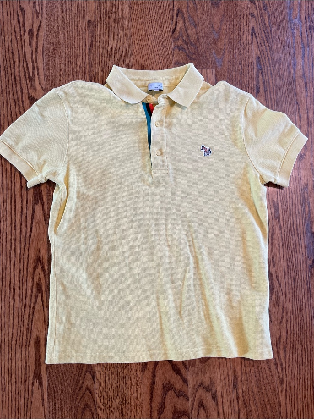 Paul Smith Jr. yellow polo with signature zebra embroidery